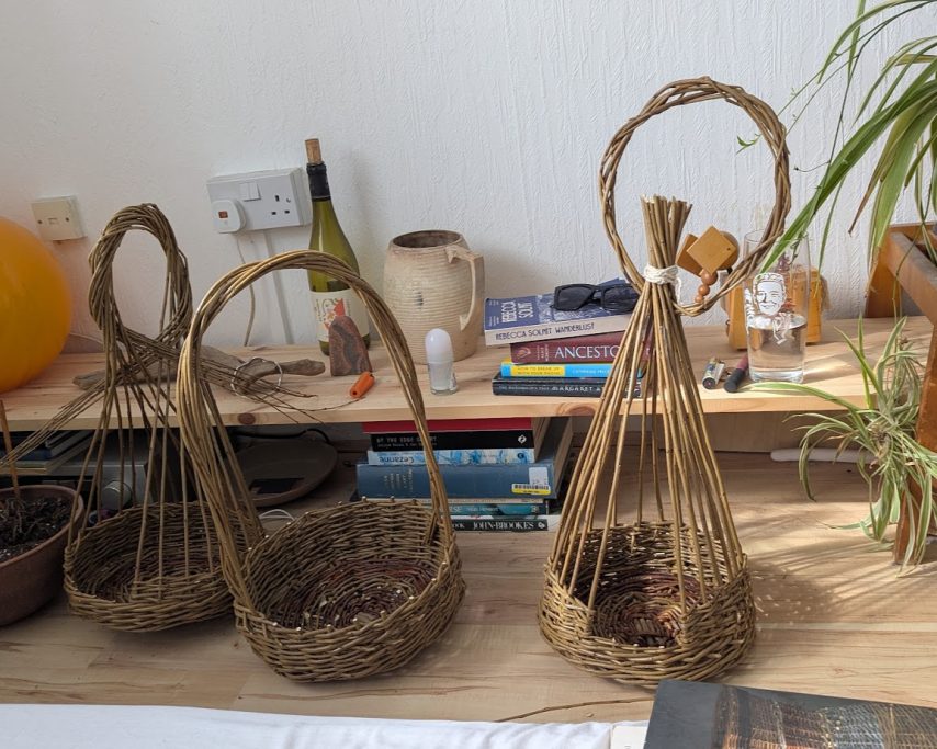 Three handmade willow bird feeders